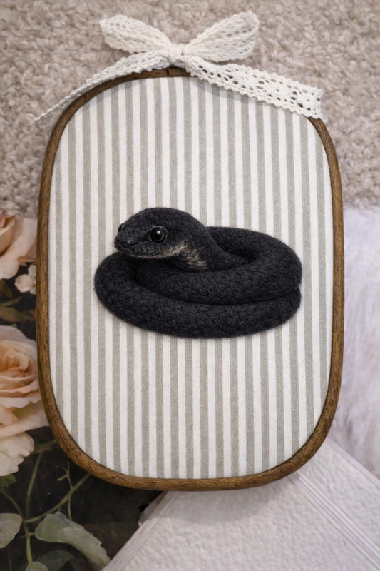 felted snake portrait